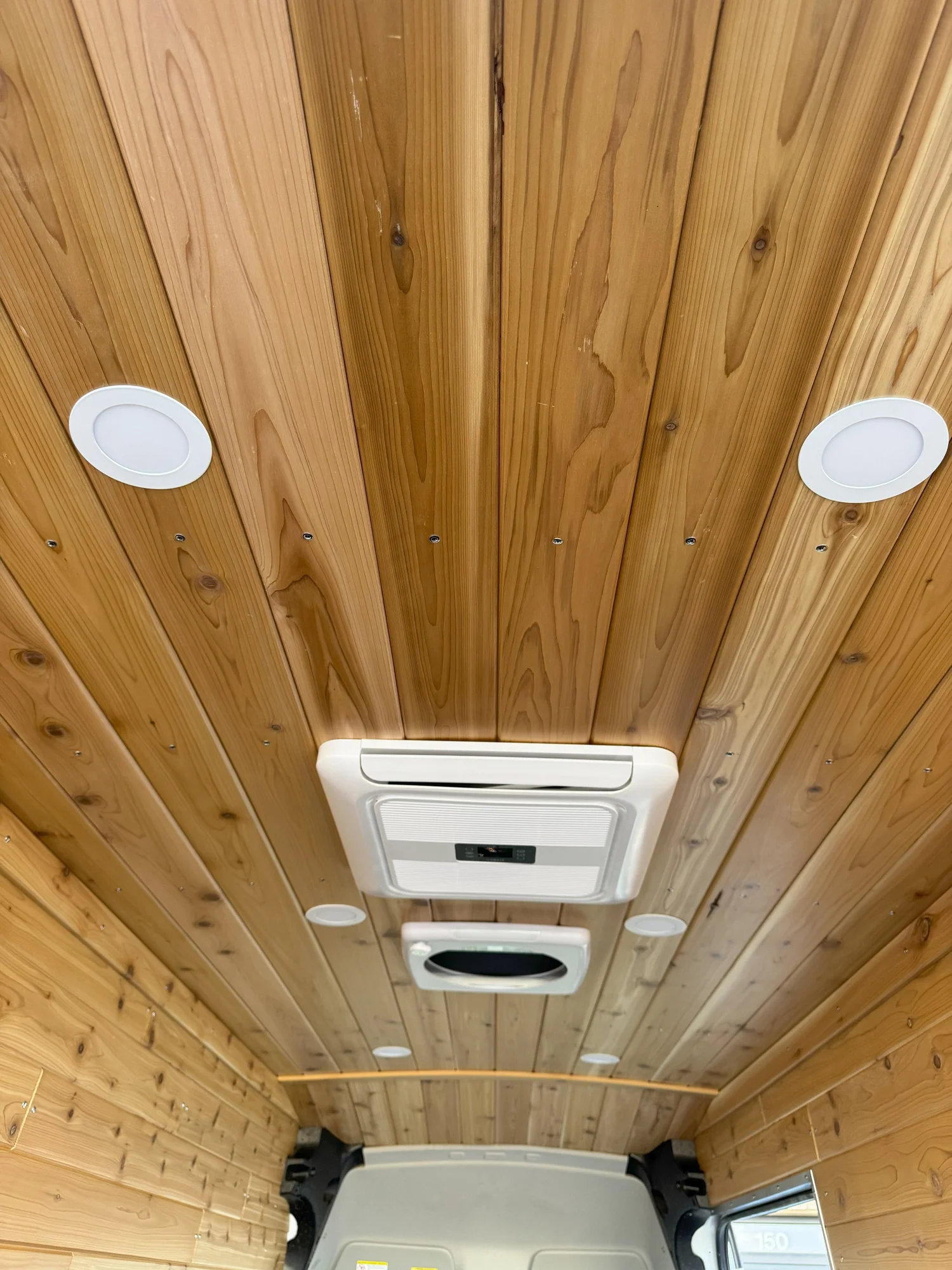 Cedar Minimal electrical installation inside its dedicated black battery cabinet
