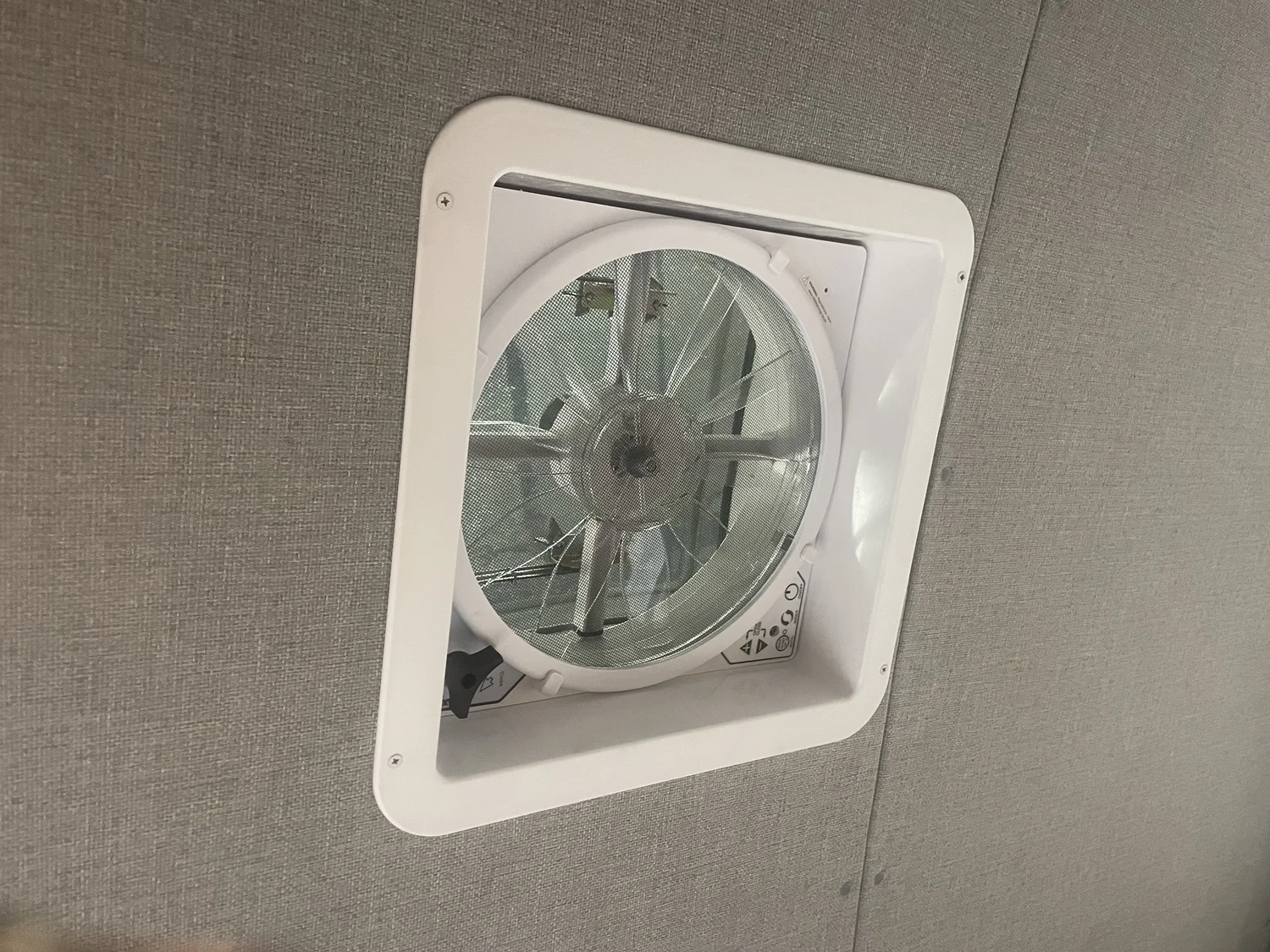 A roof fan finished into the ceiling of the Nissan build.