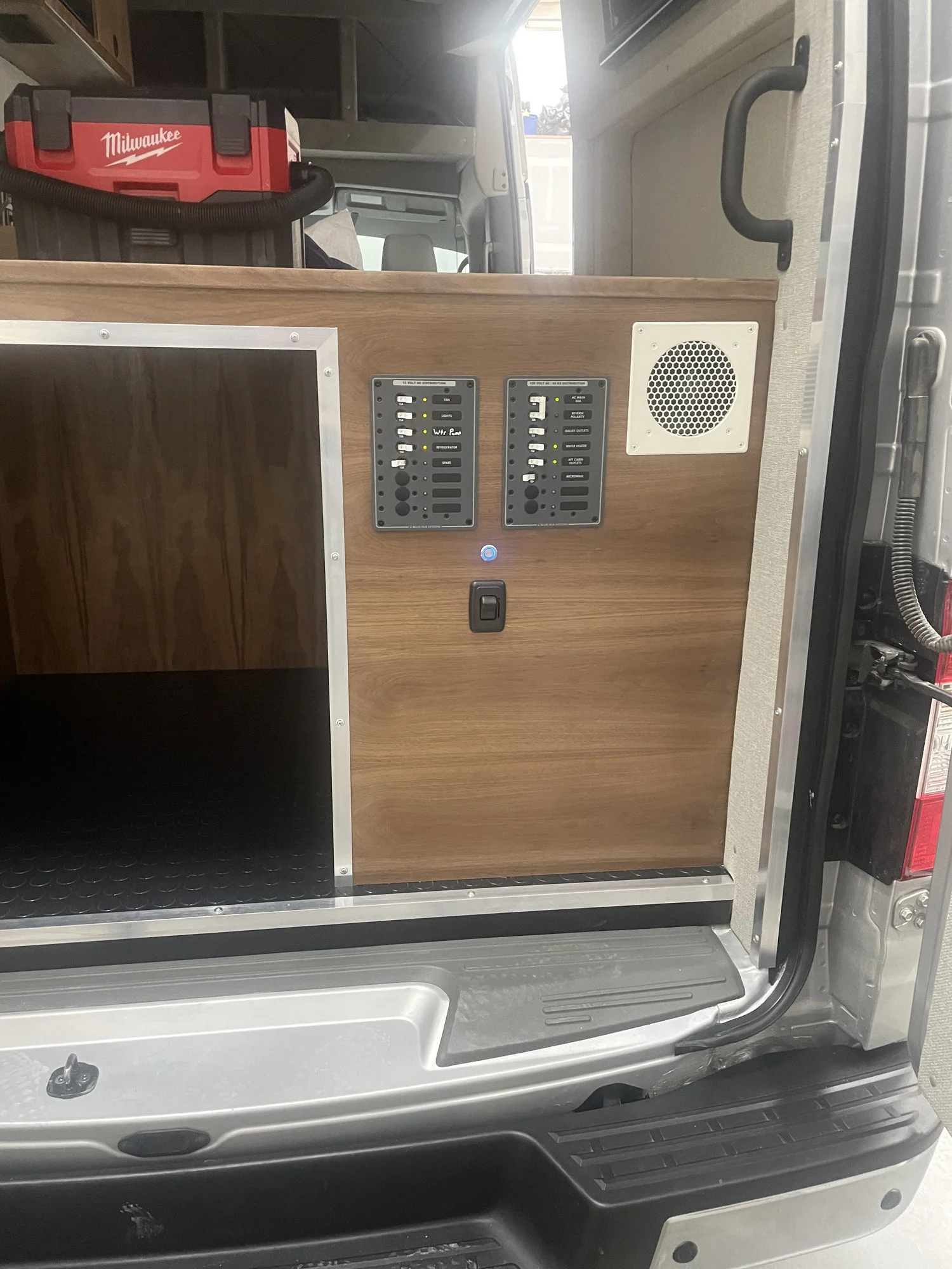 The rear bed protects a deep utility and storage zone below.