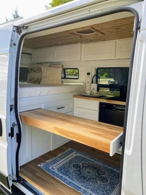 The galley brings the daily essentials within reach of the sliding door.
