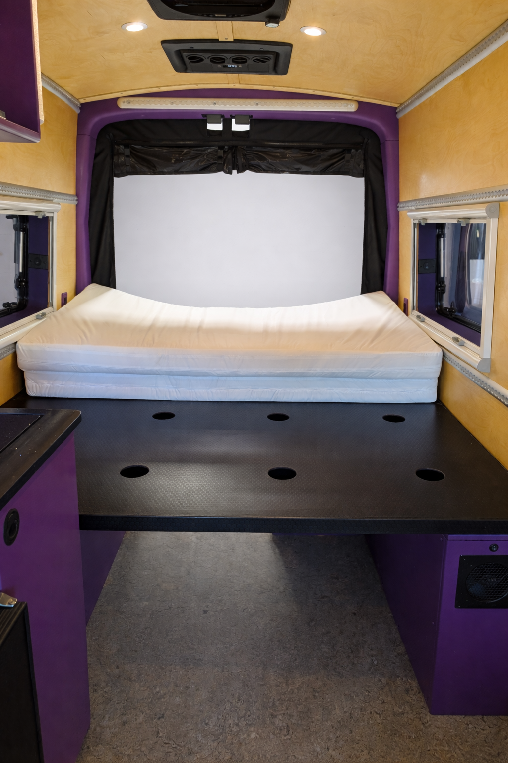 Frida's removable mattress revealing the ventilated bed platform