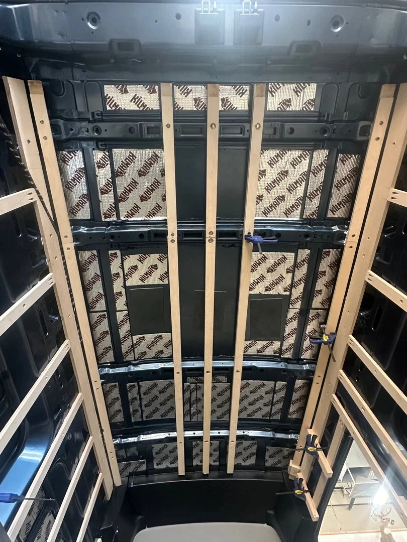Sound-deadening material and timber framing installed inside Frida