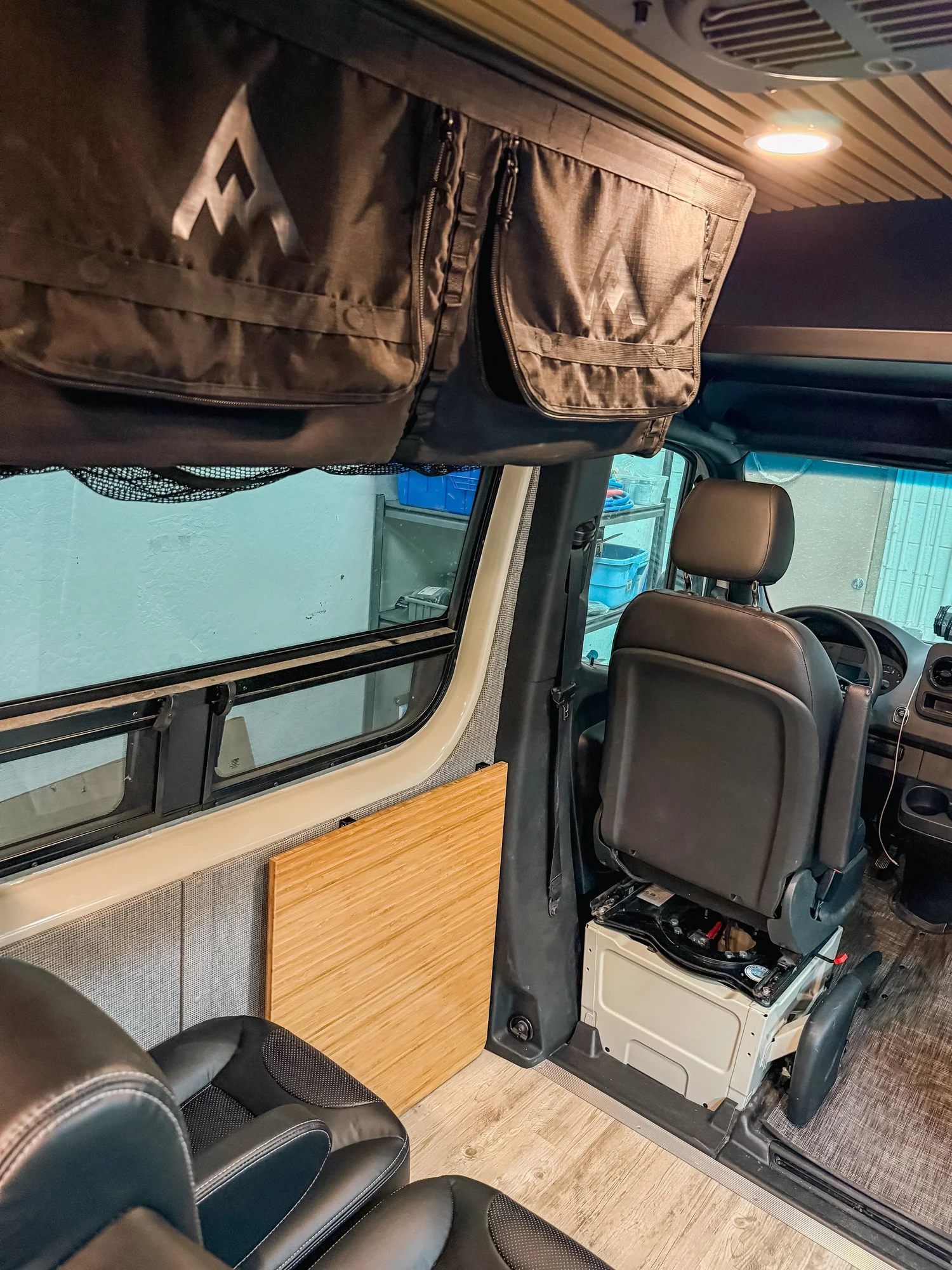The side window and its opening section meet the finished interior trim.