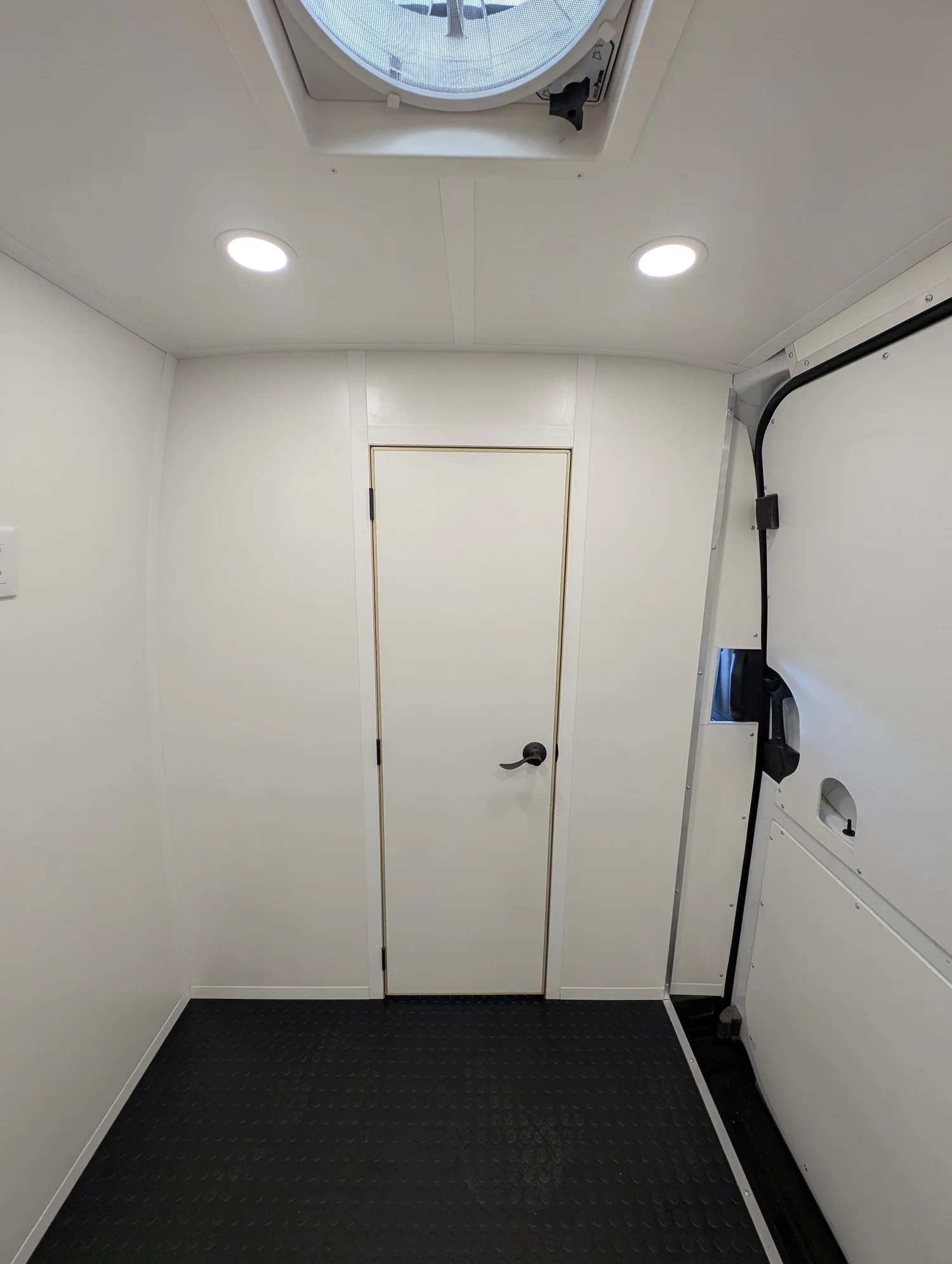 Custom cabinetry puts tools where the operator expects them.